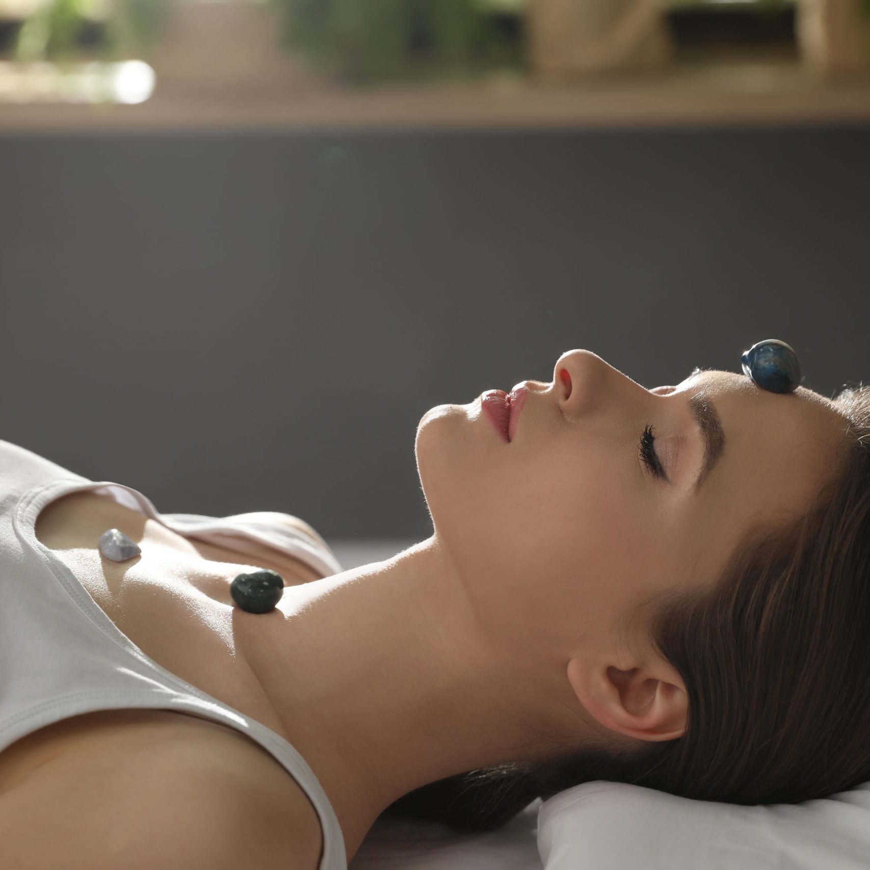 Alexandra Falticeni giving an energy healing session in her Arvada, CO studio